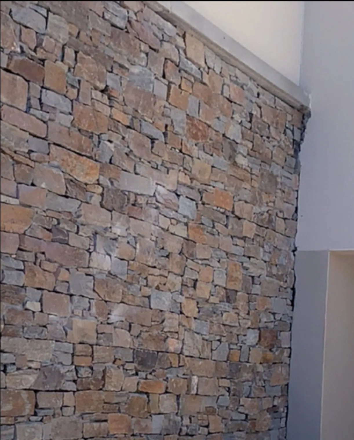 Mur intérieur en pierre de parement